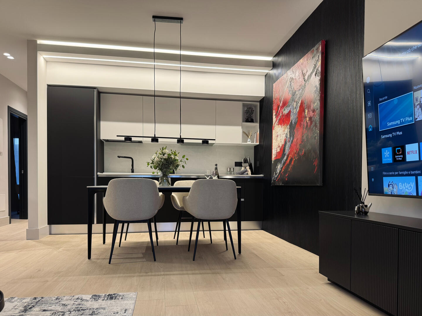 Loads of space and only the finest furniture and high-end finish, huge 75" TV.